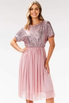 Koktajlowa sukienka na wesele rozkloszowana z cekinami róż