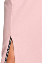 Sukienka sportowa z dzianiny bawełnianej z kołnierzem różowa