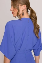 Elegancki kombinezon damski z kopertowym dekoltem niebieski