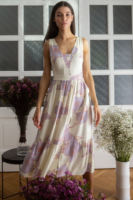 Rozkloszowana sukienka na lato w kwiaty kremowa